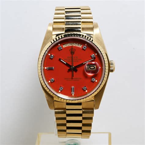 rolex day date red stella dial